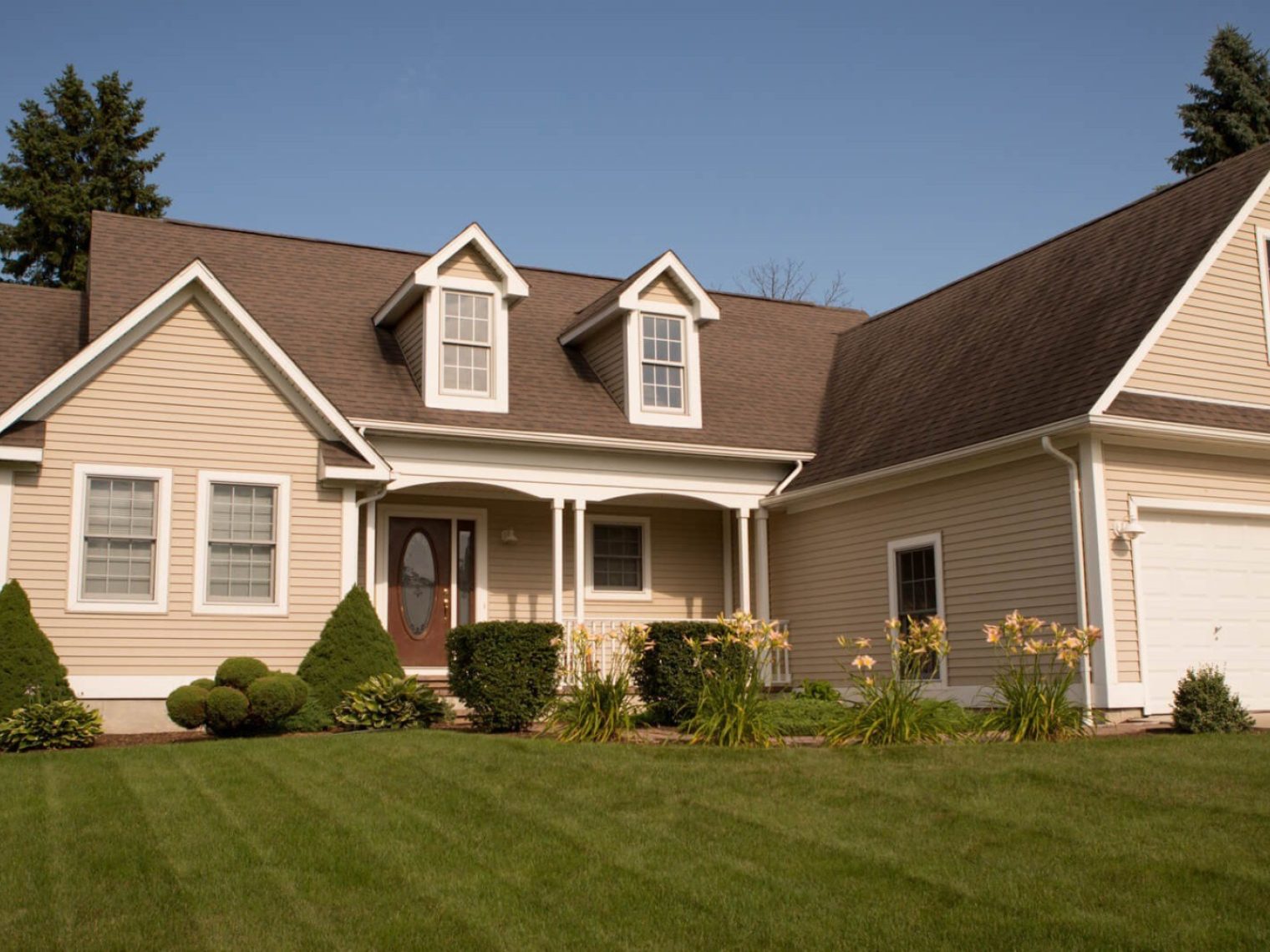 Suburban house with spacious lawn.