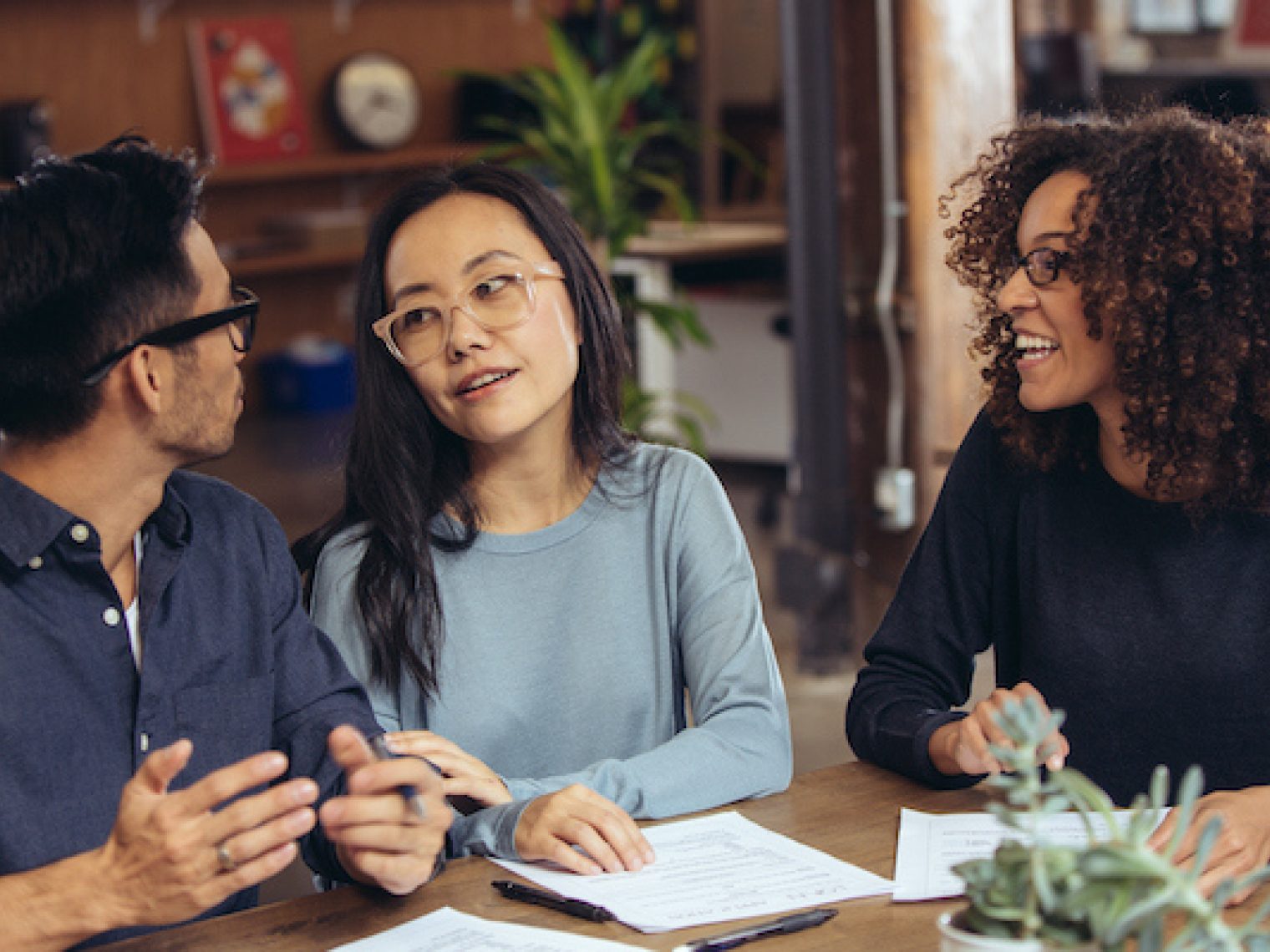 Couple getting mortgage refinance advice.